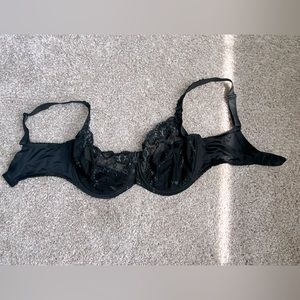 Gorgeous black bra with detailed embroidery. Never worn and was wrong size.